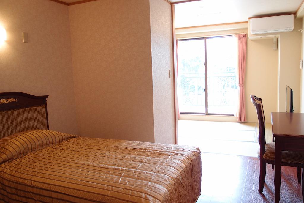 Hotel Castlevillage Miyakojima Habitación foto
